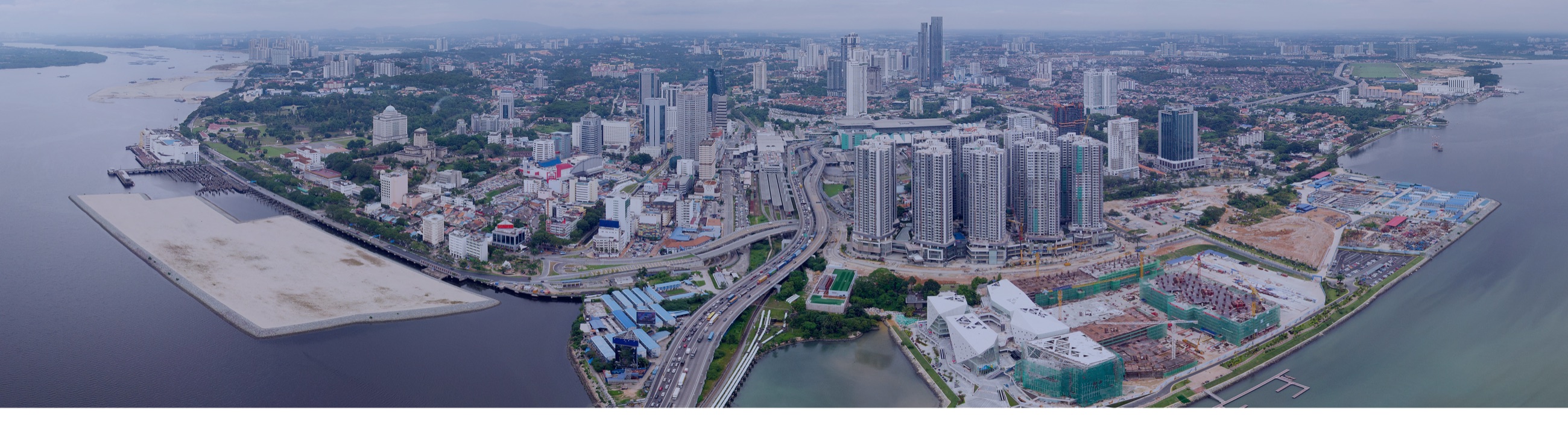 Aerial panorama of Johor Bahru and the Johor–Singapore waterfront